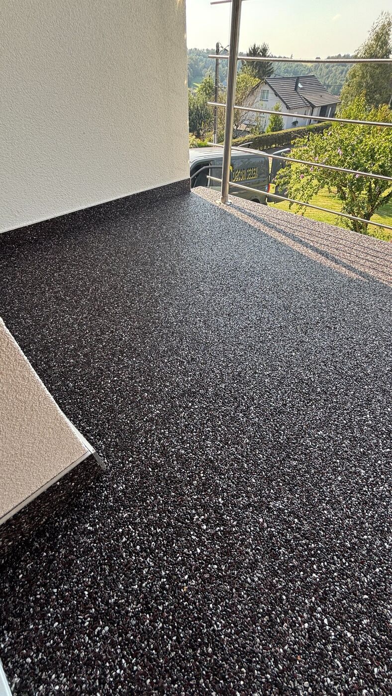 Balcon - Tapis de pierre noir et blanc